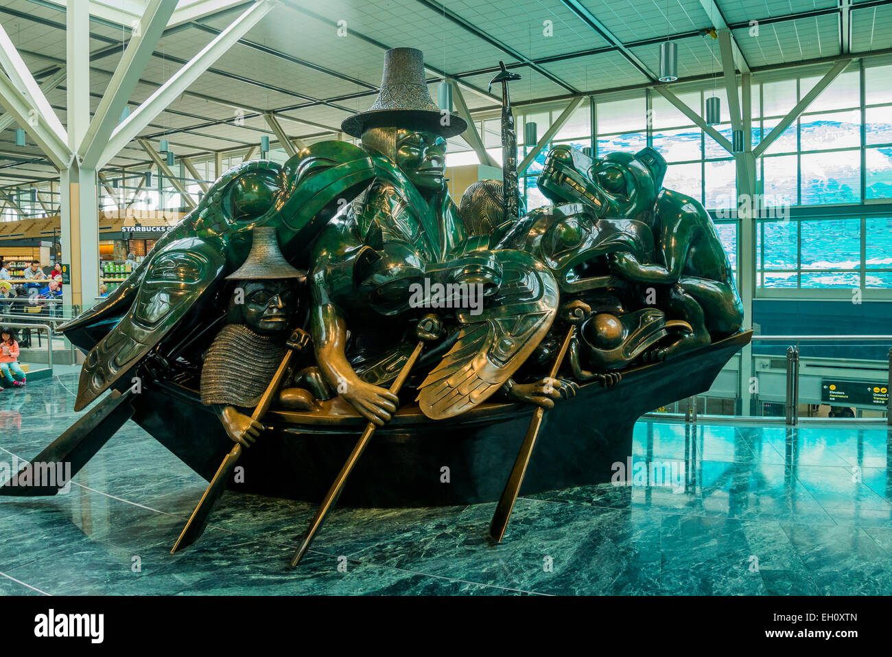Cast bronze sculpture, The Spirit of Haida Gwaii, the Jade Canoe, artist Bill Reid,  Vancouver Airport, YVR, Richmond, BC Canada Stock Photo