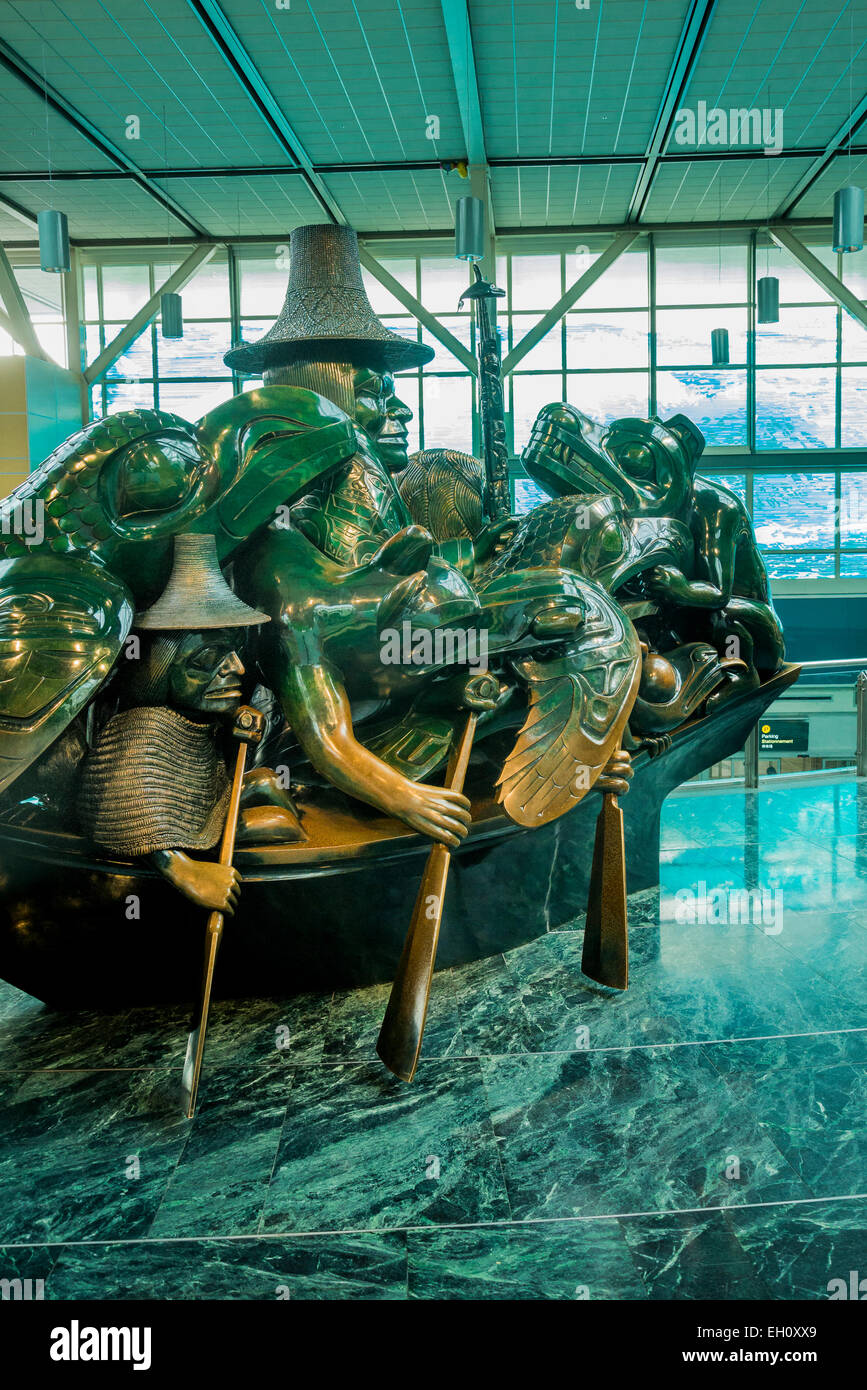 Cast bronze sculpture, The Spirit of Haida Gwaii, the Jade Canoe, artist Bill Reid,  Vancouver Airport, YVR, Richmond, BC Canada Stock Photo