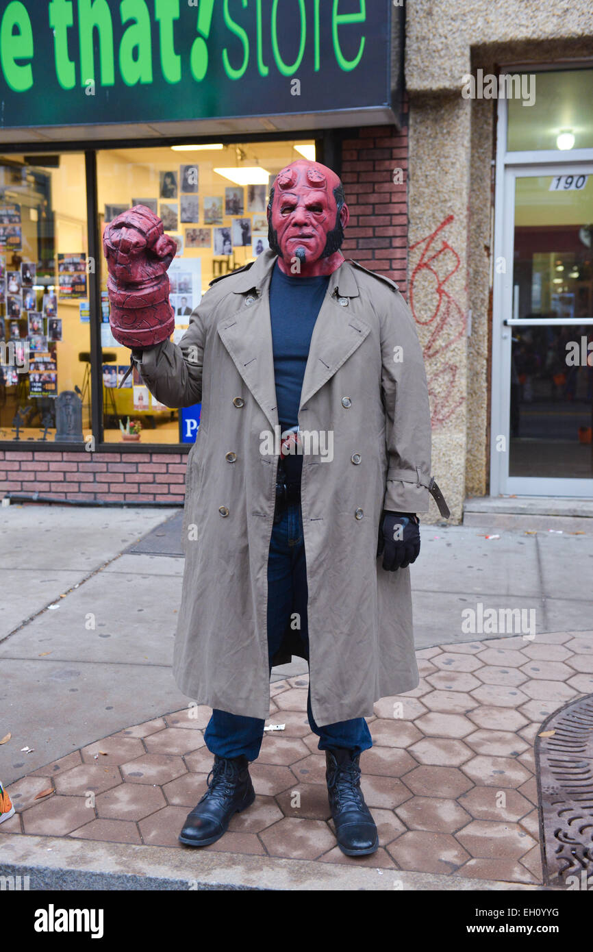 Young adult posing in a Hell Boy costume during the halloween 2013 in Newark, New Jersey. Stock Photo
