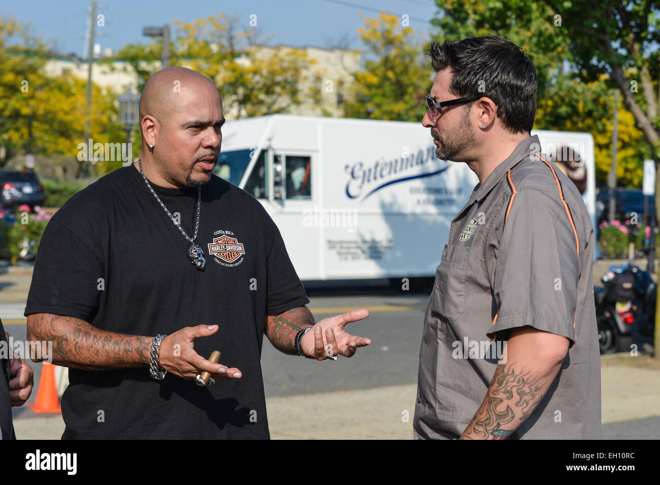 Two bikers talking during the Liberty Harley Davidson dealer anniversary party. Rahway, New Jersey. USA Stock Photo