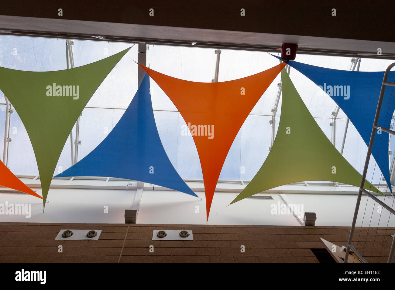 Modern office interior with coloured flags as a design feature Stock Photo