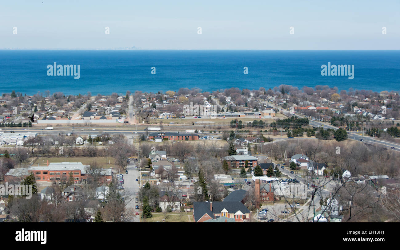 A panoramic view of Lake Ontario with Grimsby in the foreground and Toronto visible across