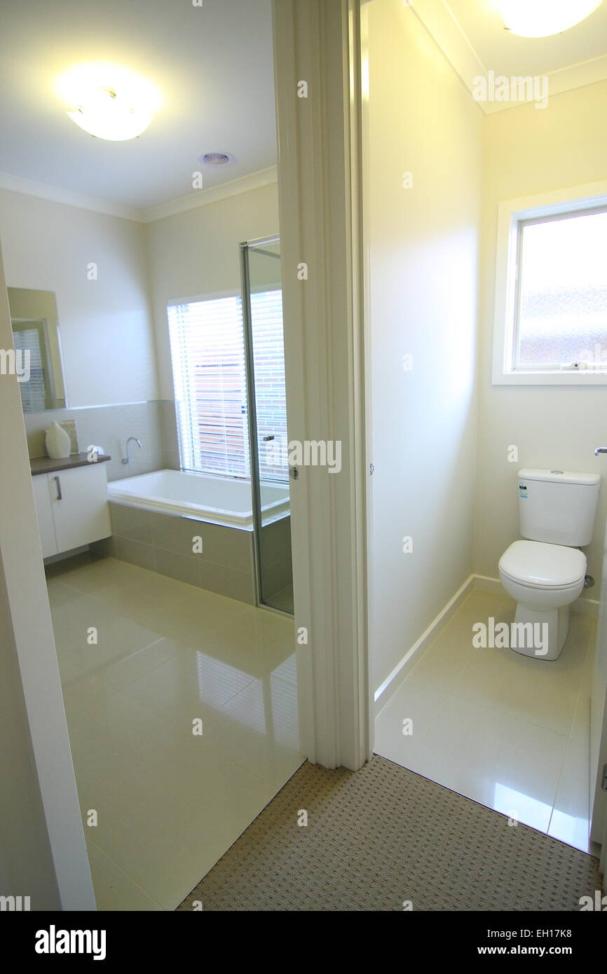 Modern bathroom with separate toilet Stock Photo - Alamy