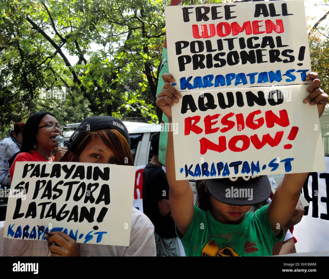 Filipino activists display placards rally hires stock photography and