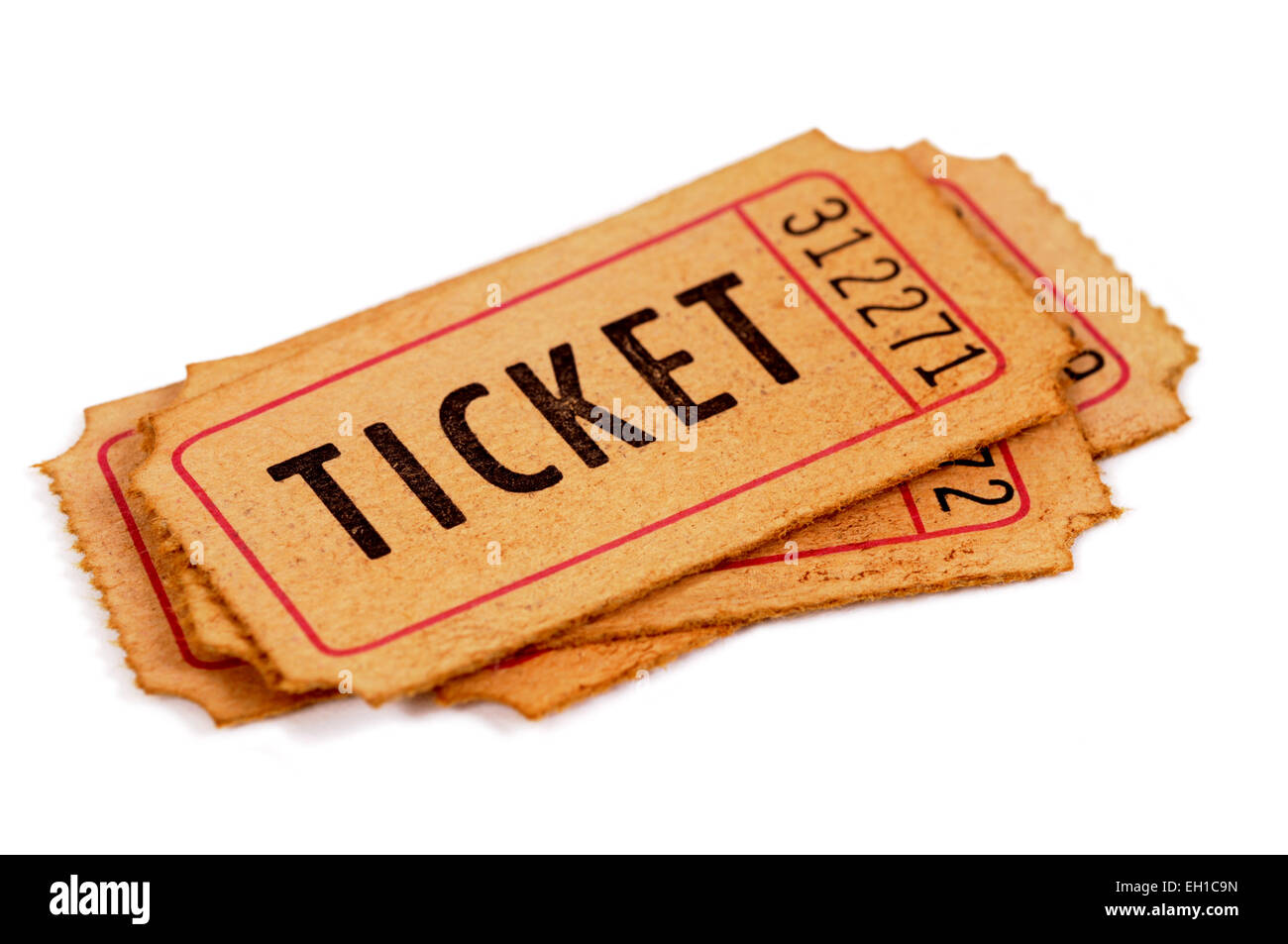 Small pile of old admission tickets isolated on a white background. Stock Photo