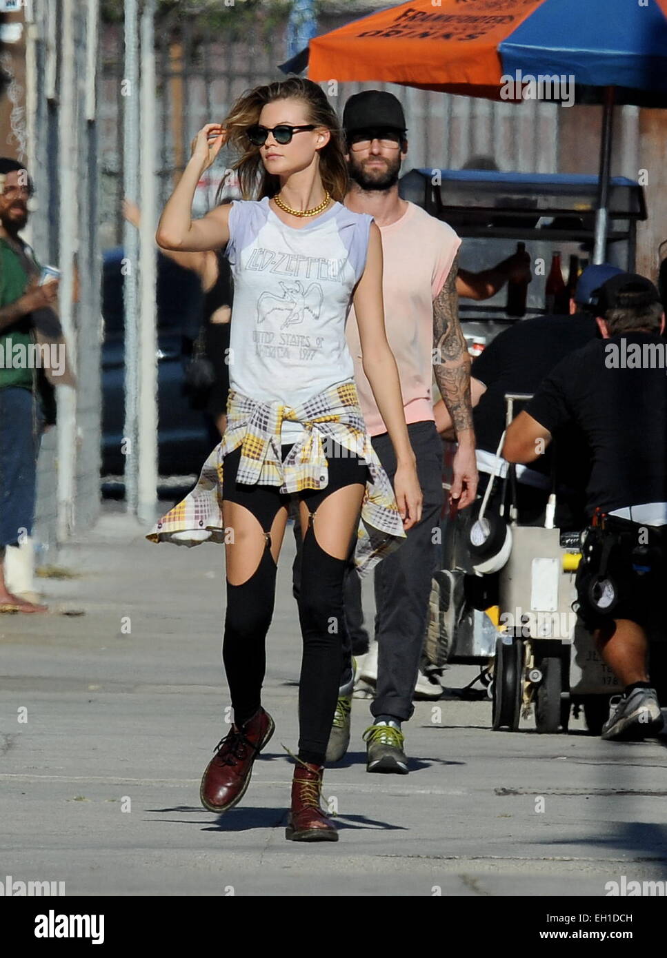 Adam Levine and wife Behati Prinsloo on the set of Maroon 5's music video  for their next single 'Animals' Featuring: Adam Levine,Behati Prinsloo  Where: Los Angeles, California, United States When: 30 Aug
