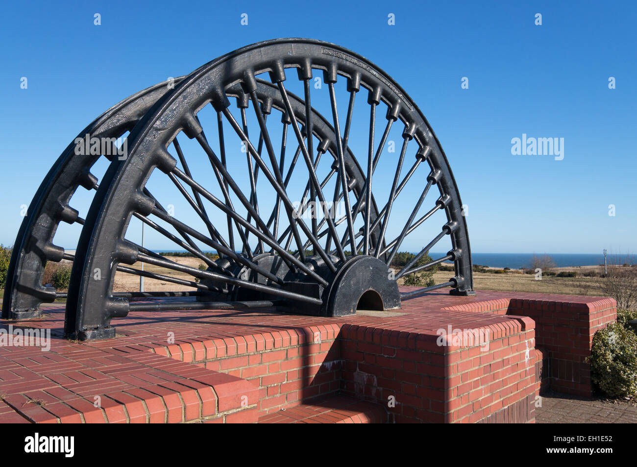 Pit wheels, memorial to Horden Colliery or coal mine and miners, Co. Durham, England, UK Stock Photo