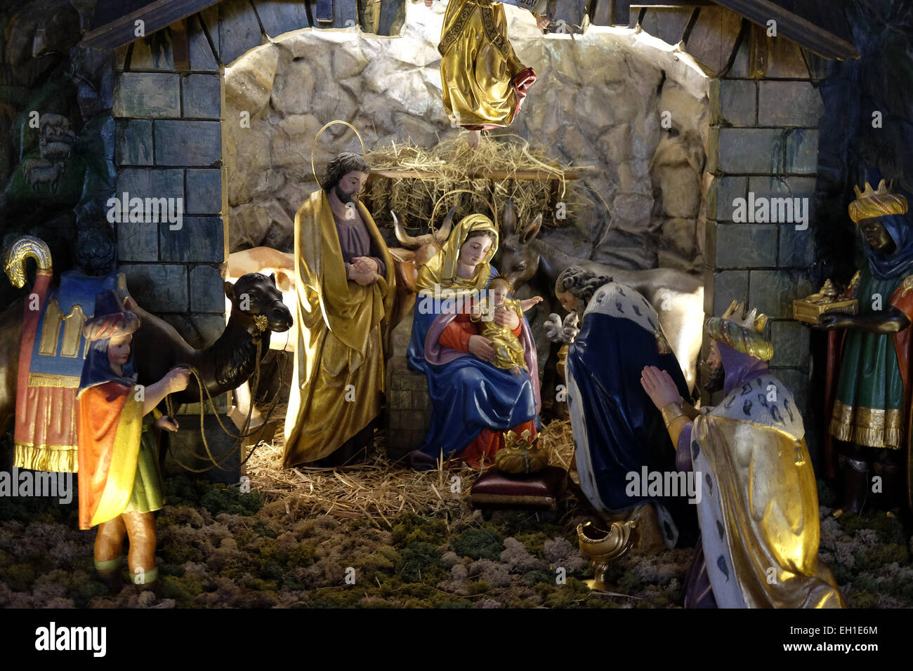 Holy family with the infant jesus in the crib hires stock photography