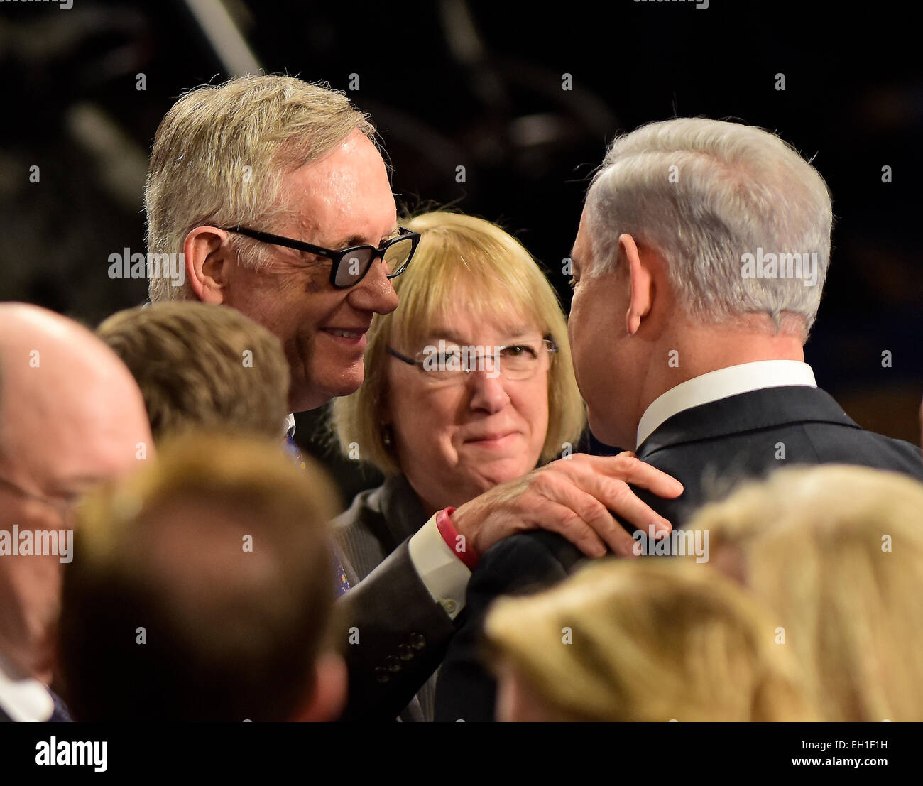 United States Senate Minority Leader Harry Reid (Democrat of Nevada) greets Prime Minister Benjamin Netanyahu of Israel as he arrives to deliver an address to a joint session of the United States Congress in the U.S. Capitol in Washington, DC on Tuesday, March 3, 2015. At center is U.S. Senator Patty Murray (Democrat of Washington). Credit: Ron Sachs/CNP (RESTRICTION: NO New York or New Jersey Newspapers or newspapers within a 75 mile radius of New York City) - NO WIRE SERVICE - Stock Photo