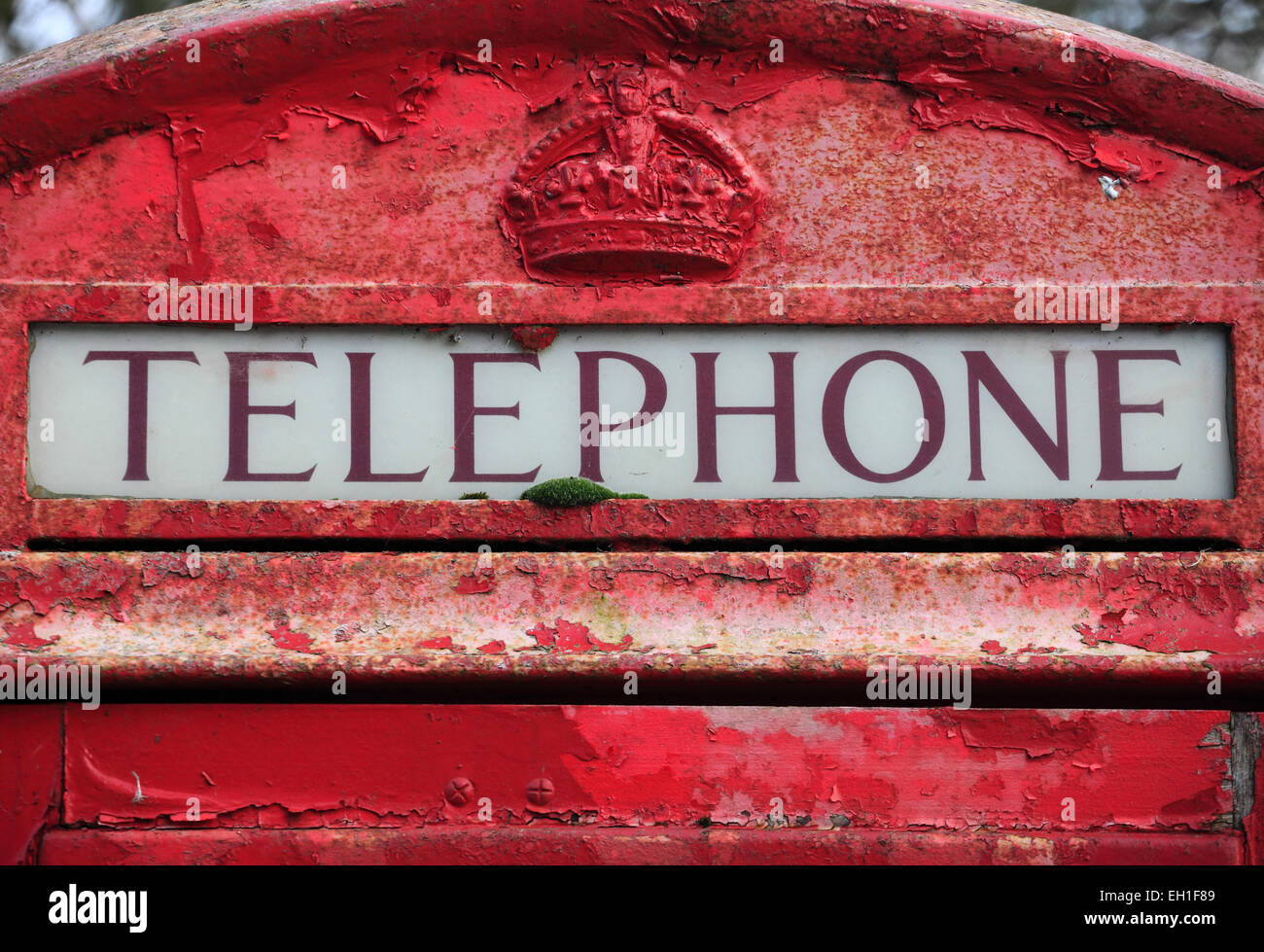 Traditional red telephone box in a rural Norfolk village. Stock Photo