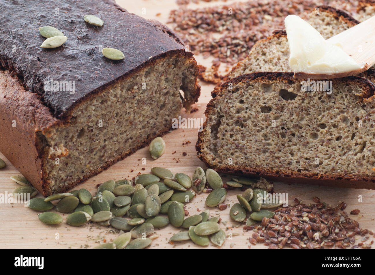Homemade low carb gluten-free almond flour bread with pumpkin and flax seeds. Stock Photo