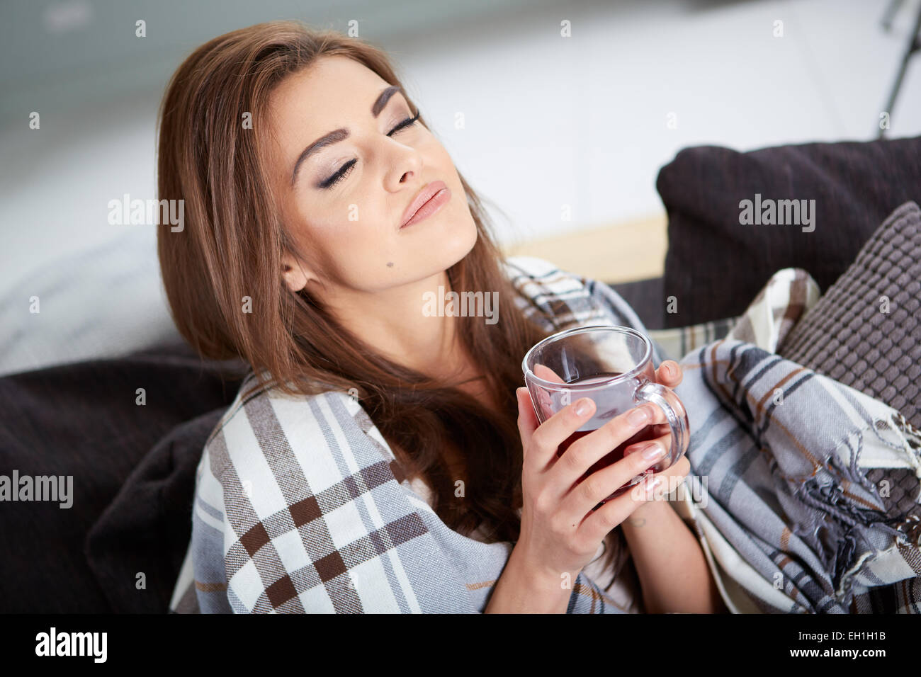 young woman caught a cold Stock Photo Alamy
