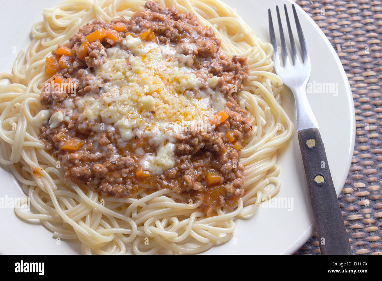 Spaghetti bolognese on plate with fork Stock Photo