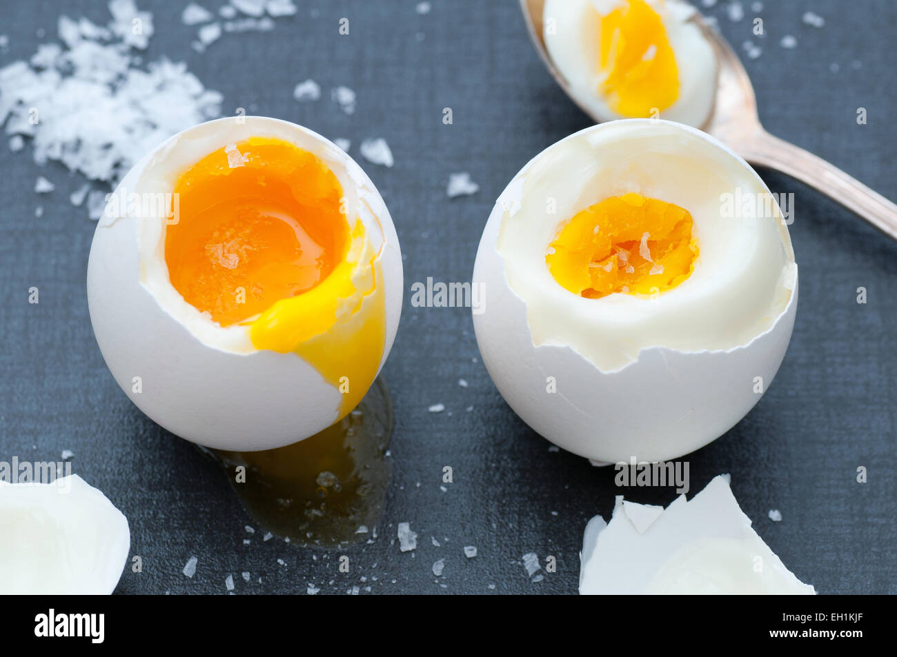 Soft boiled and hard boiled egg with sea salt. Stock Photo