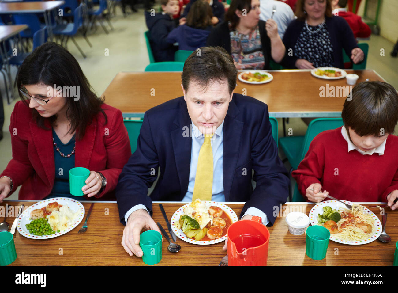 Liberal democrat leader Nick Clegg eats lunch at Botley school during a visit to launch the party's manifesto Stock Photo