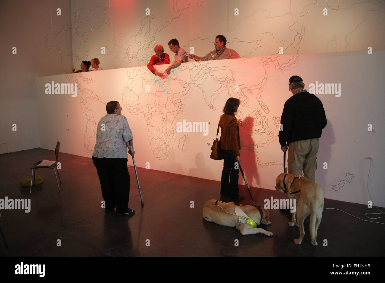 Visually impaired people at art exhibition at Nottingham Art Exchange