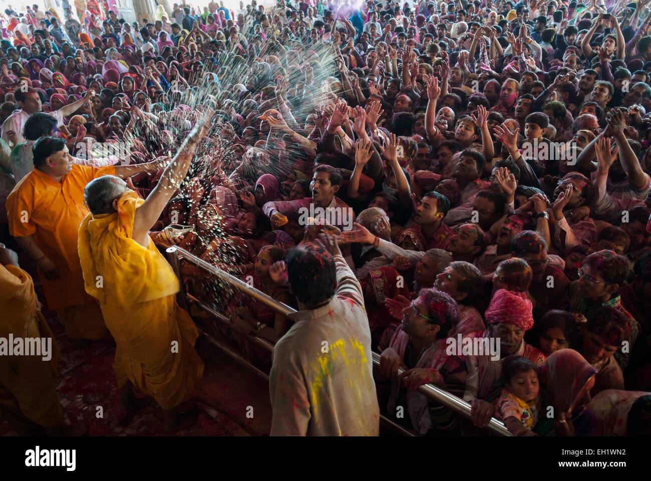 Jaipur, India. 5th Mar, 2015. Indian Hindu devotees celebrate the Holi festival at the Govind Dev Ji temple in Jaipur, India, March 5, 2015. The tradition of Holi, also known as the festival of colors, is celebrated to mark the beginning of spring season. Credit:  Tumpa Mondal/Xinhua/Alamy Live News Stock Photo