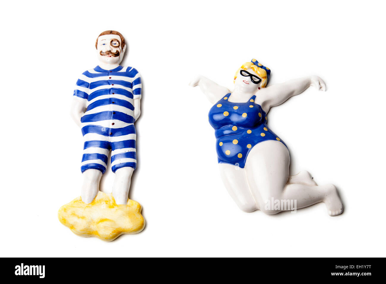 Funny swimmers wall hanging pottery. Stock Photo