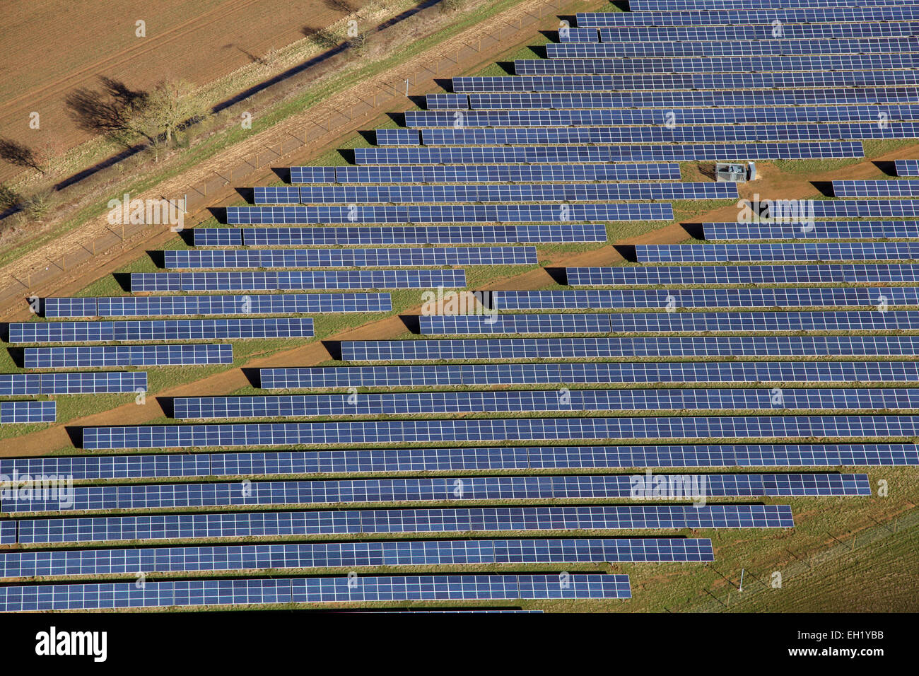 a close-up aerial view of solar panels (pv cells) on a solar farm in the UK Stock Photo