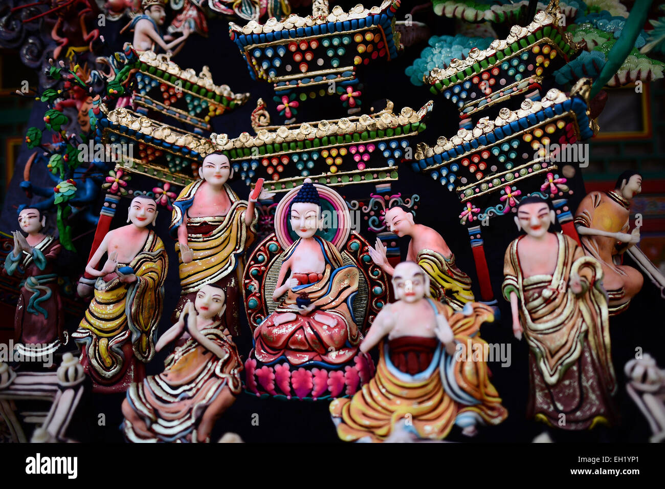 Xining, China's Qinghai Province. 5th Mar, 2015. Ghee flower figurines are seen at Taer Monastery in Xining, northwest China's Qinghai Province, March 5, 2015. Ghee flower exhibitions are held in Taer Monastery in Qinghai Province and Labrang Monastery in Gansu Province, both presitigious Tibetan Buddhist monasteries, to celebrate the Lantern Festival on March 5. Credit:  Zhang Hongxiang/Xinhua/Alamy Live News Stock Photo