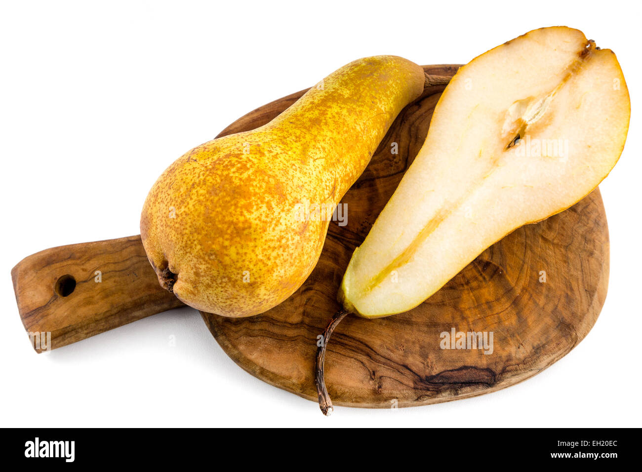 Pear on the table - whole and halved pear Stock Photo