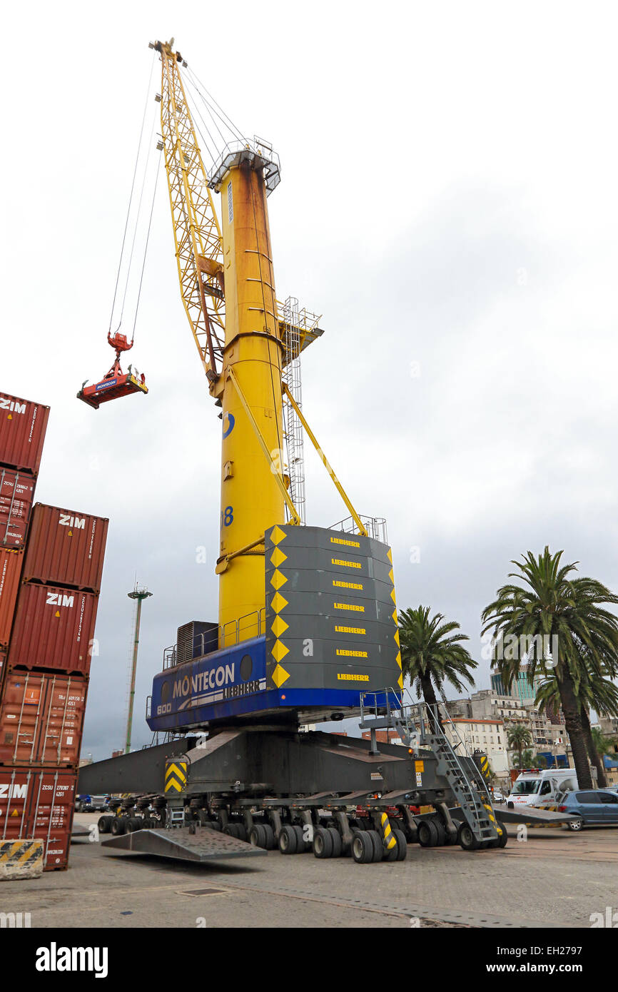 Shipping containers, container, at the dock with lifting crane. Montevideo, Uruguay. Stock Photo