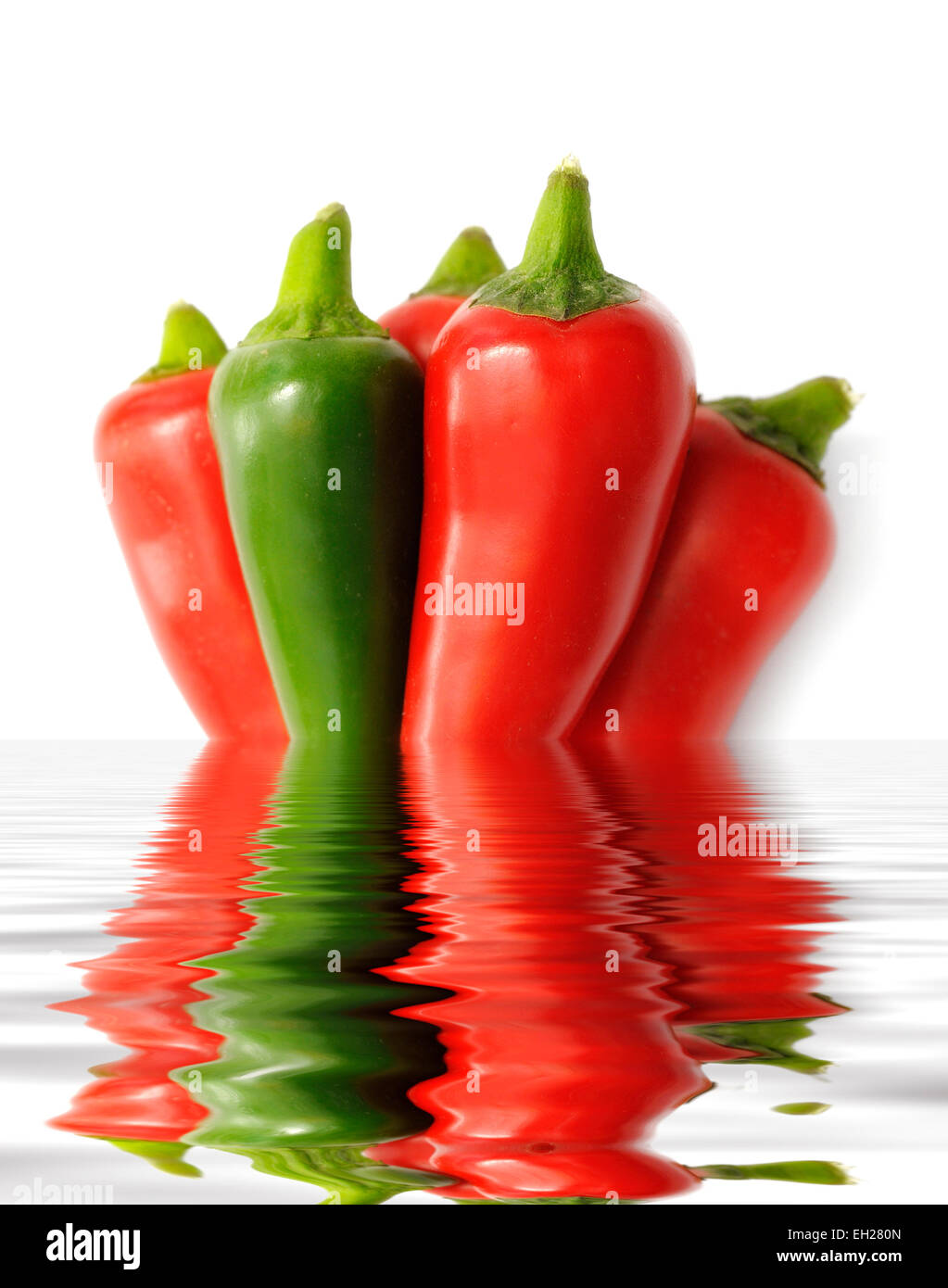 Mixed chili peppers in a digitally created pool of water Stock Photo
