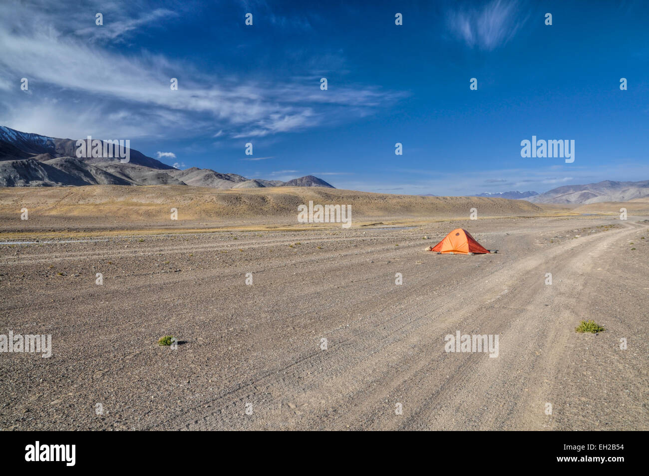 Tent by the road in Pamir mountains in Tajikistan Stock Photo