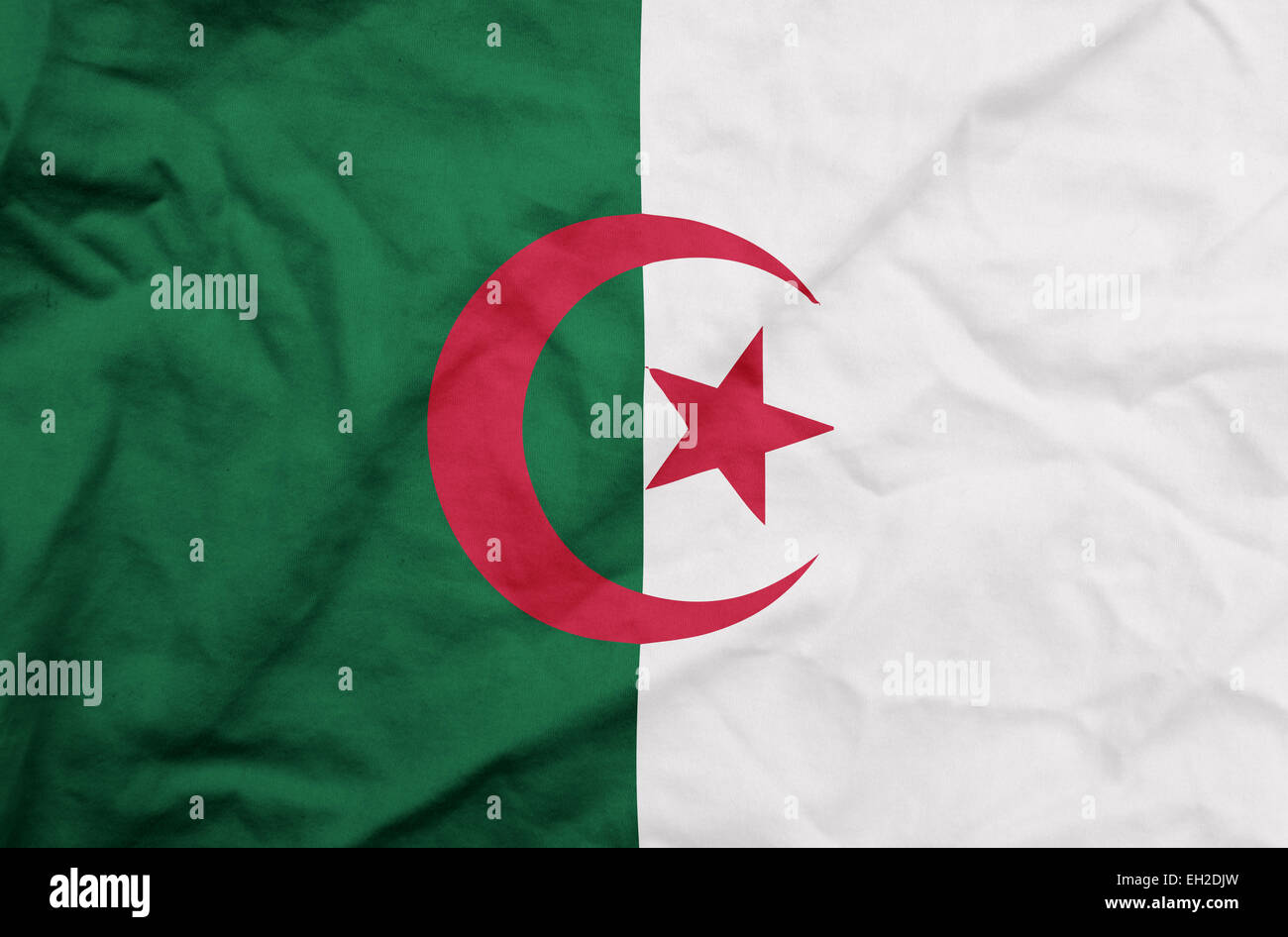 Algeria - Waving national flag on silk texture Stock Photo