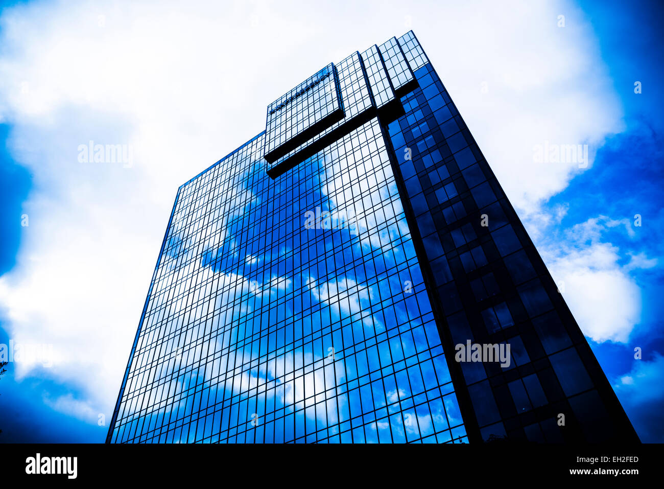 Moody Skyscraper business office block Stock Photo