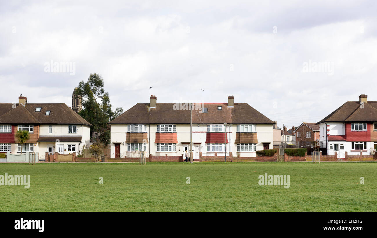 London suburban semi detached houses on green Stock Photo