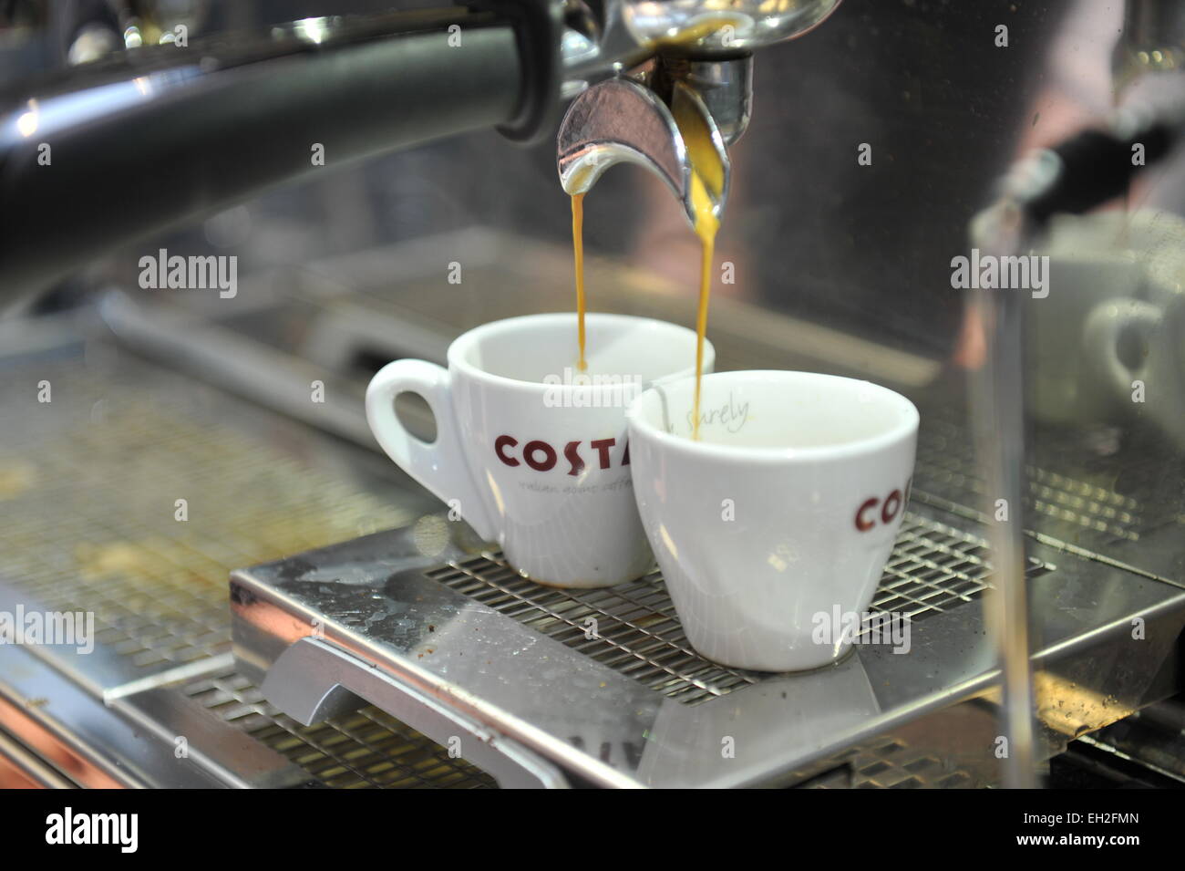 Coffee machine making espresso coffee. Stock Photo