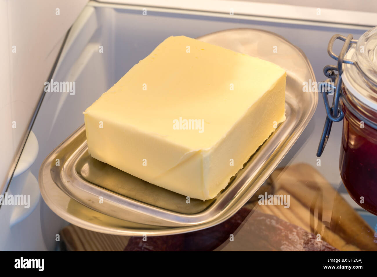 Butter in the fridge with the door open Stock Photo Alamy