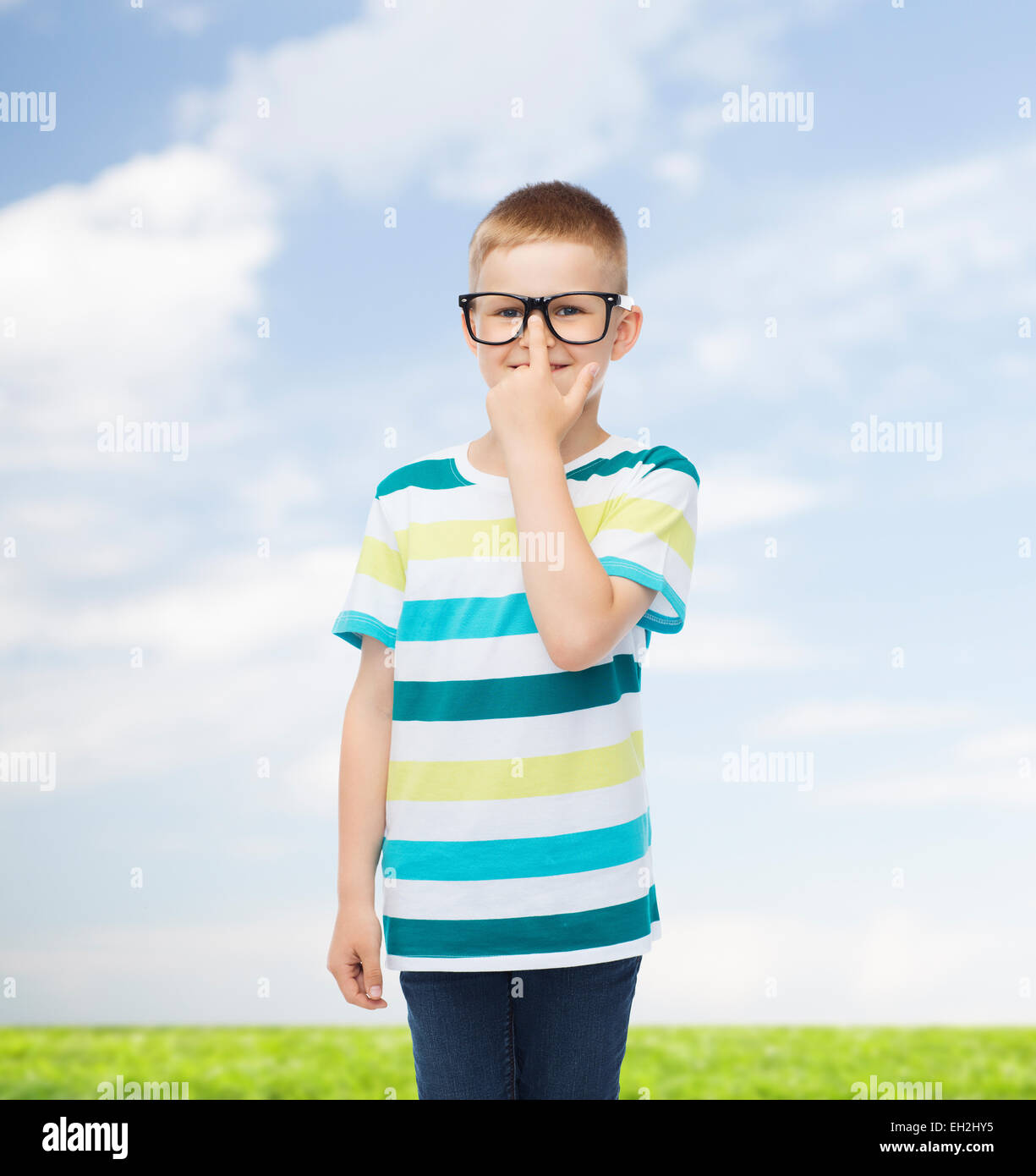 smiling little boy in eyeglasses Stock Photo