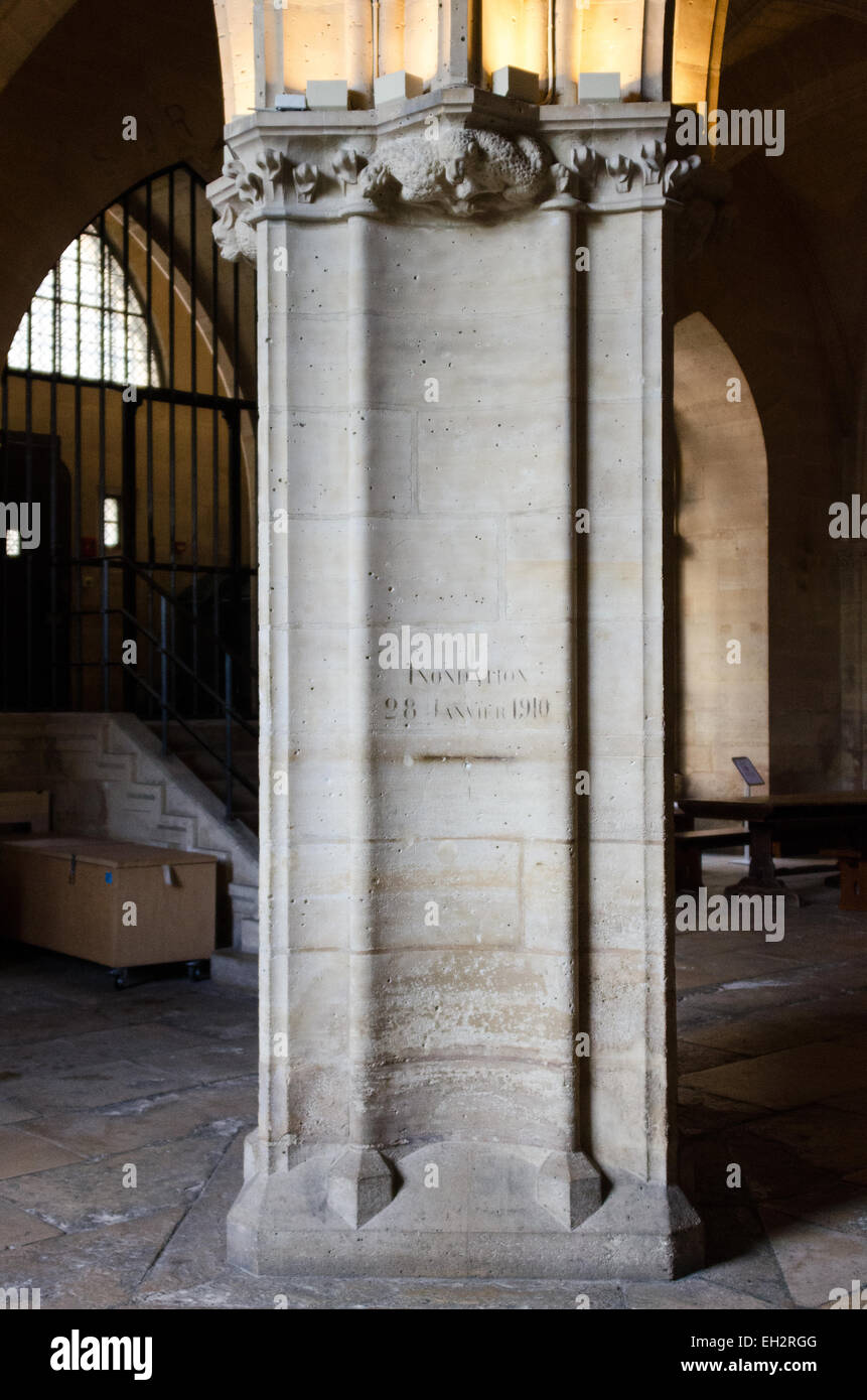 The height of the water during the Great Flood of 1910 is carved on a pillar in La salle des Gardes, La Congiergerie, Paris. Stock Photo