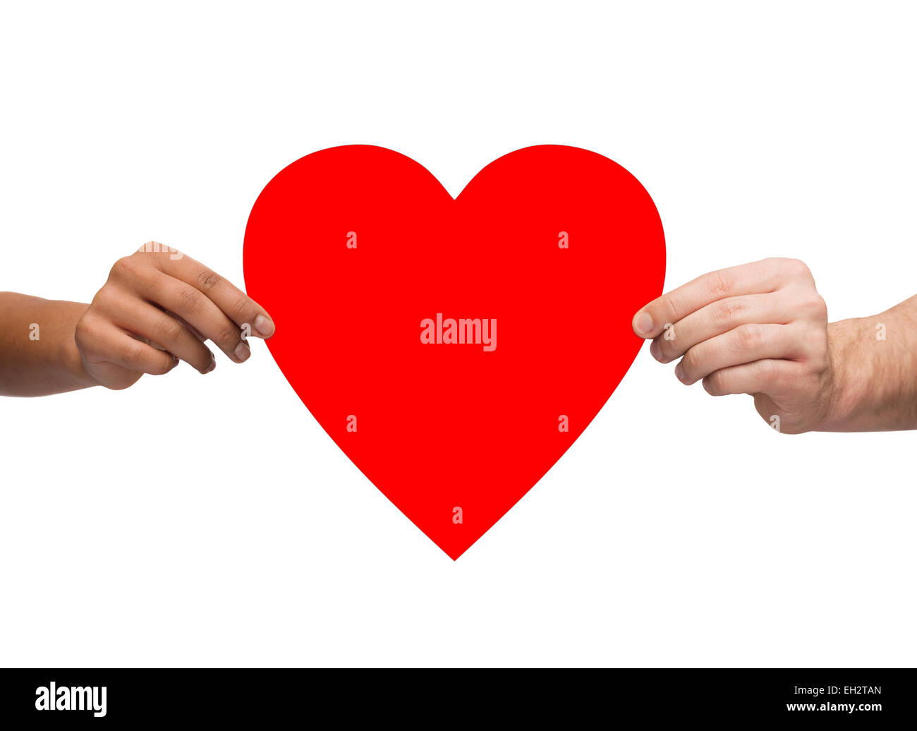 couple hands holding red heart Stock Photo - Alamy