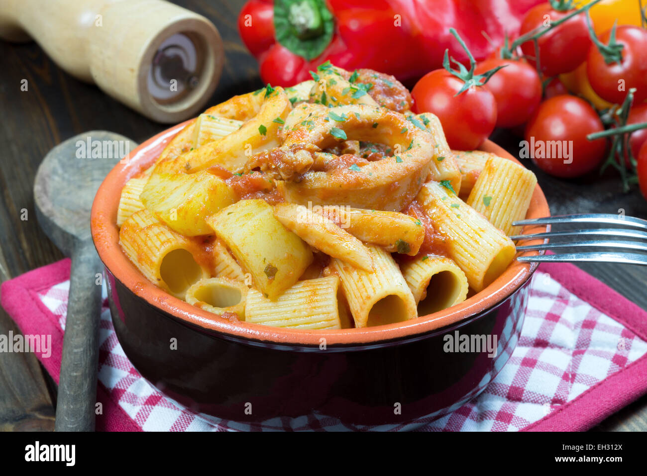 red gurnard soup with mezze maniche italian pasta Stock Photo