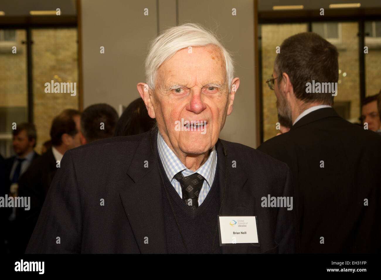 Brian Niel at Global Friends of Ukraine photographic exhibition at the House of Commons to launch Victims of War Support Project. London, United Kingdom. 05.03.2015 Stock Photo