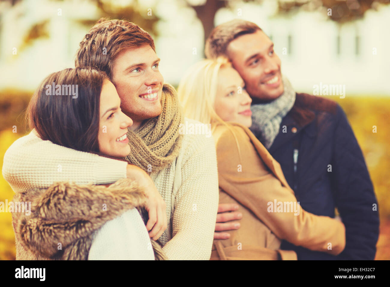 group of friends having fun in autumn park Stock Photo - Alamy