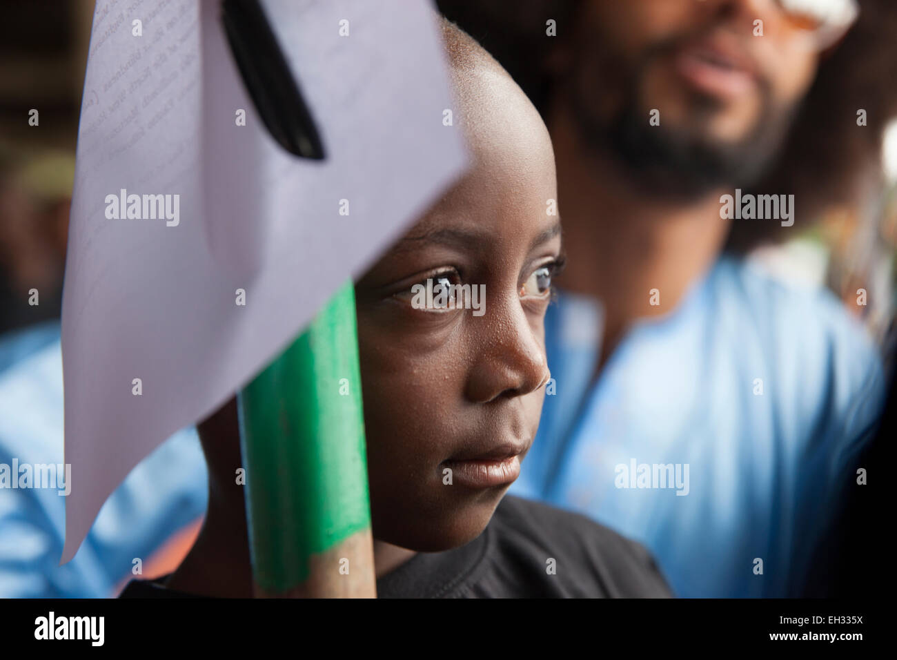 Benoit Assou-Ekotto,  with Nahbila Cydney, who will be the recipient of the 250 millionth treatment  for River Blindness. Stock Photo