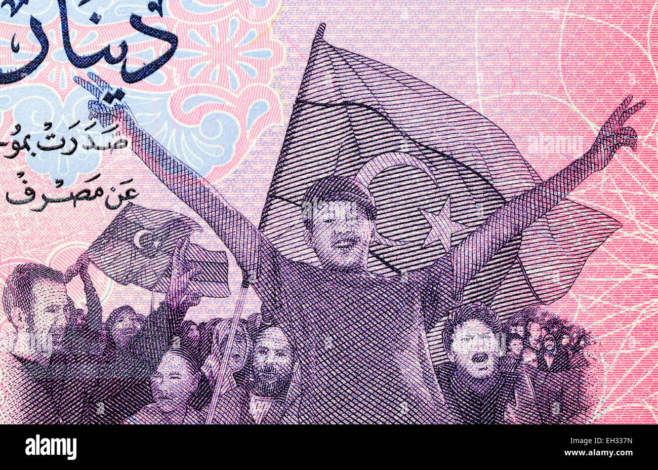 Anti-Gaddafi protesters from 1 dinar banknote, Libya, 2013 Stock Photo