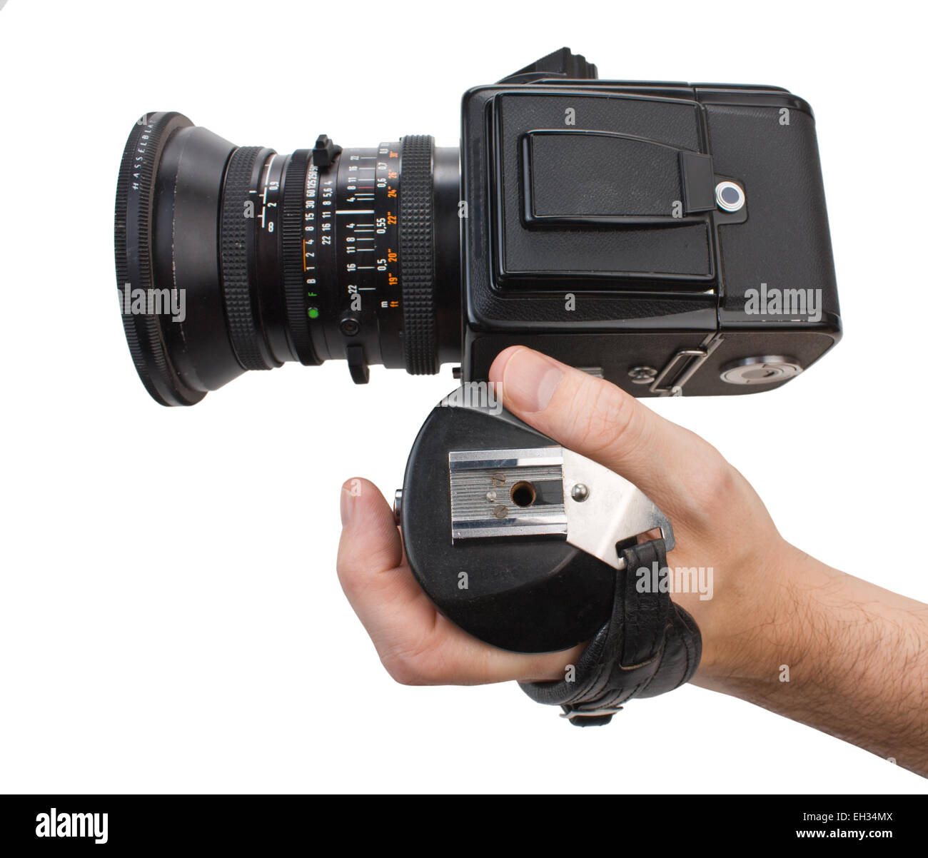 hand holds the handle of the camera isolated on white background Stock ...