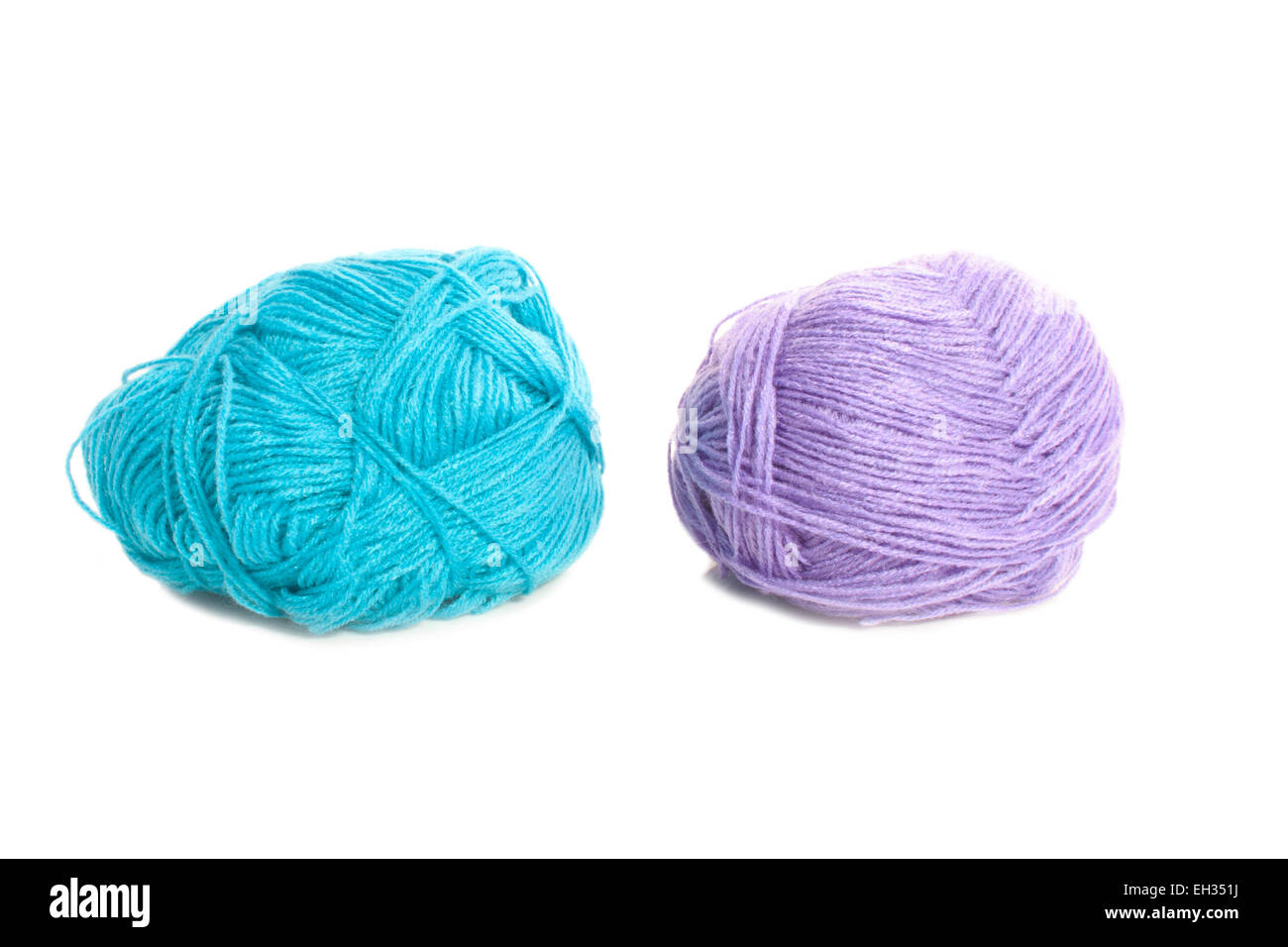 Two balls of wool pink and bleu isolated on white Stock Photo