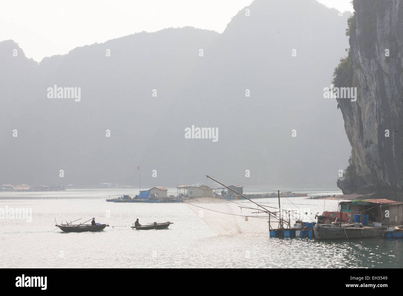 Fish farming halong bay tourist hi-res stock photography and images - Alamy