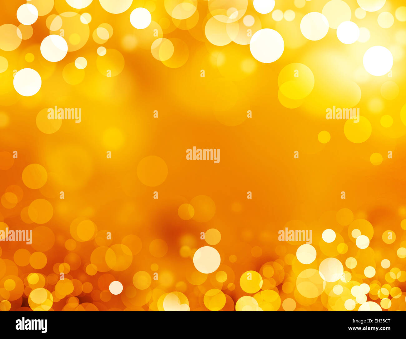 Festive sparkling lights. Shiny gold background in sparkles Stock Photo