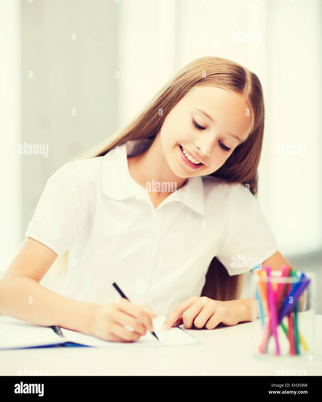 little student girl drawing at school Stock Photo - Alamy