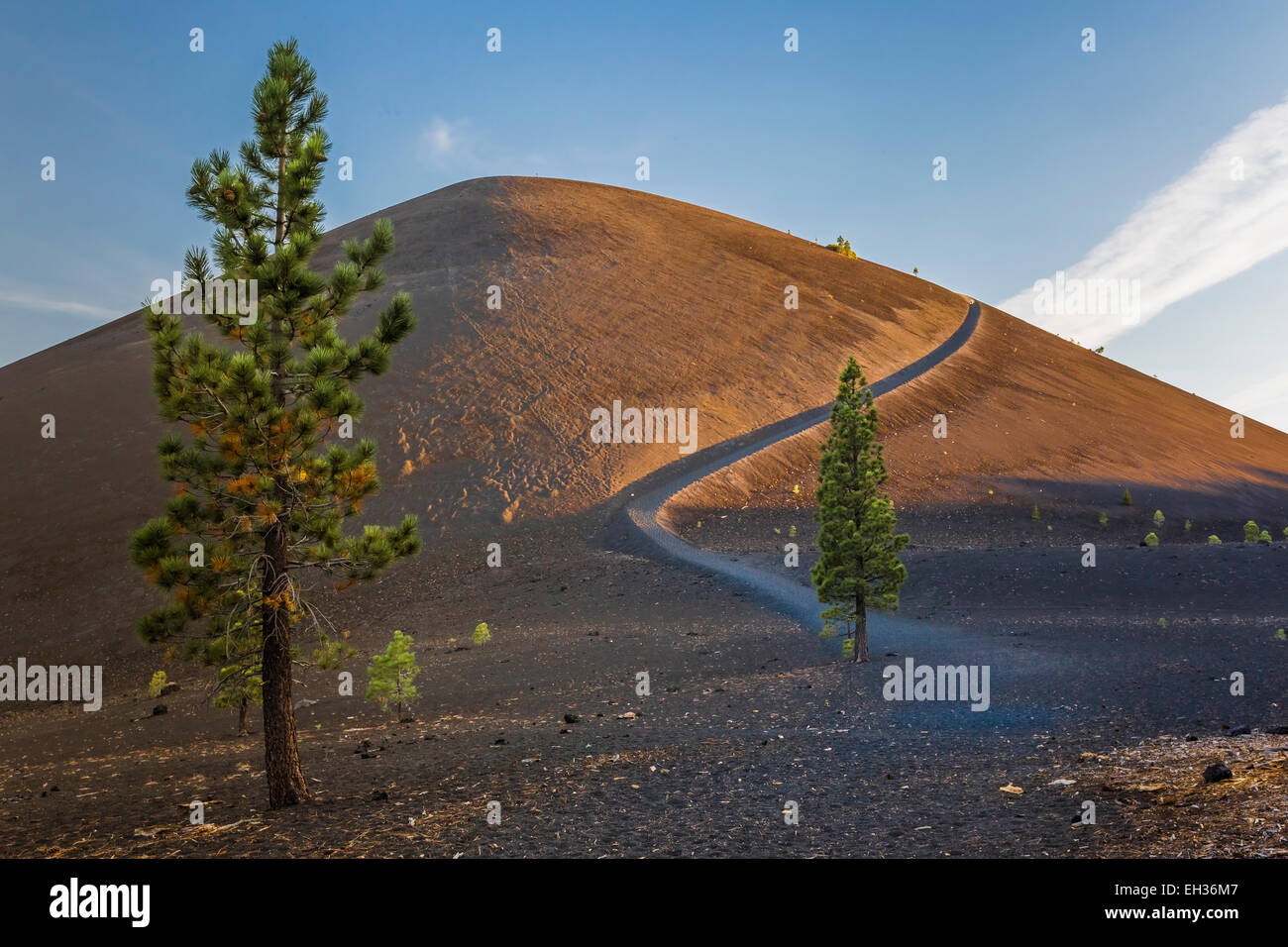 Cinder Cone Trail to the summit of Cinder Cone in late afternoon light, in Lassen Volcanic National Park, California, USA Stock Photo