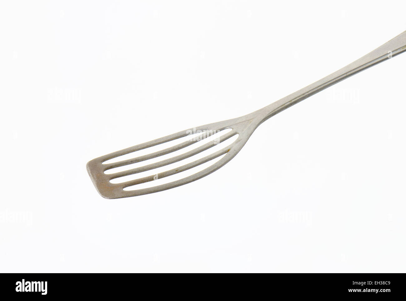 Metal spatula on white background Stock Photo