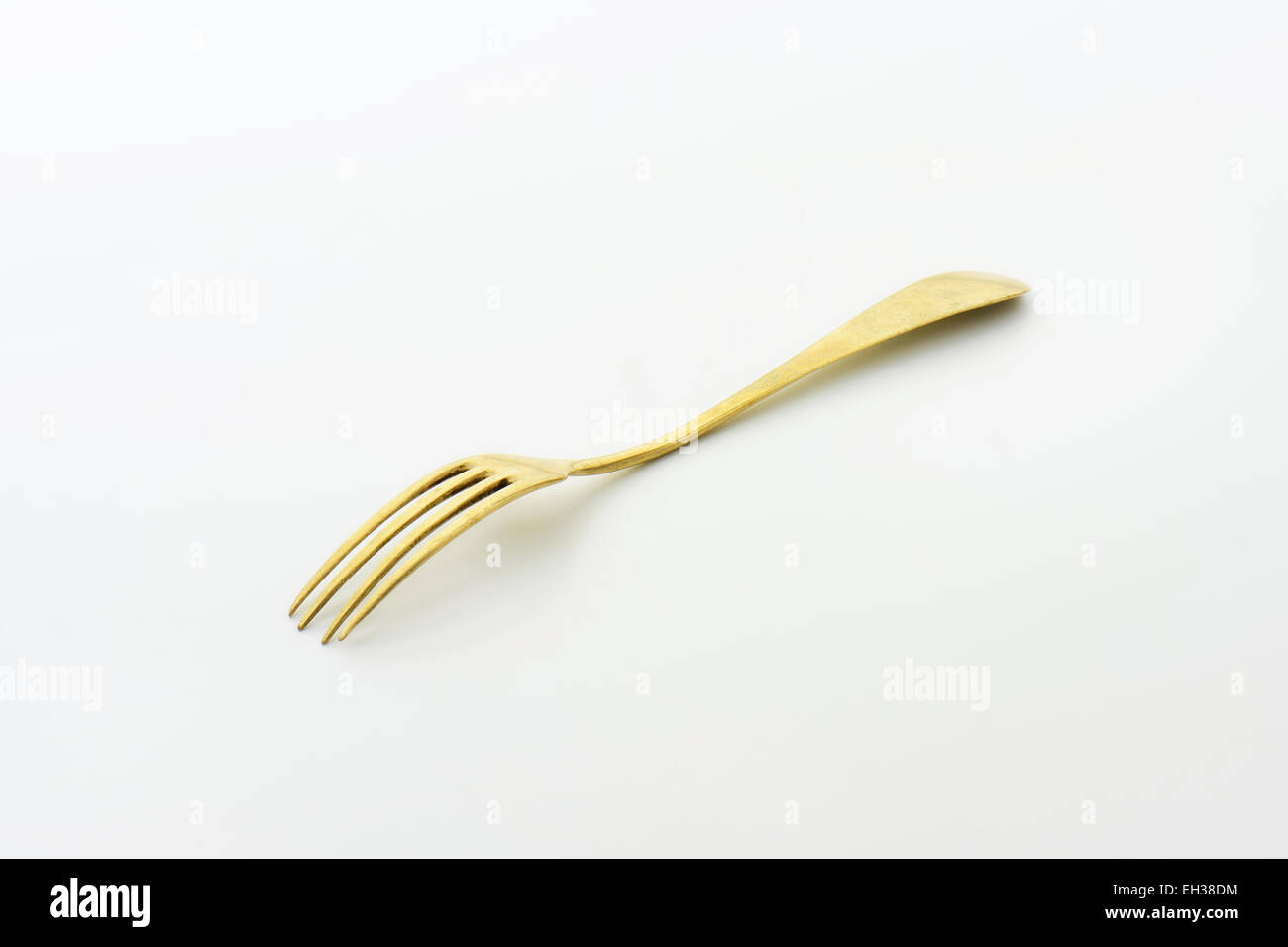 Old silver fork turned upside down Stock Photo Alamy
