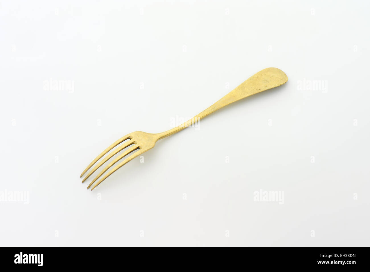 Old silver fork turned upside down Stock Photo Alamy